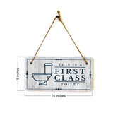This is a First-Class Toilet 5x10 Hanging Wall or Door Sign | Warm Welcoming Signage For Homes
