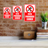 Portrait Round Plus Esta Prohibido Correr Wall or Door Sign | Spanish Dressing Room Retailer Signage