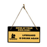 Swim At Your Own Risk! Lifeguard Is Drunk Again 5" x 10" Hanging Wall or Door Sign | Safety Signs
