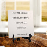 Hatred Stirs Up Strife, But Love Covers All Offenses. Proverbs 10:12 5"x 5" Square Table Sign With Acrylic Easel | Religious Bible Quotes