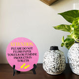 Attention Please Do Not Flush Paper Towels or Feminine Products in Toilets Circle Table Sign with Acrylic Stand (5x5") | Public Bathroom Signage