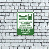 Portrait Round Plus To Be Parked Here You Must Be Plugged In And Actively Charging This is Not Preferred Parking Door or Wall Sign | Electric Vehicle Charging Station | Parking