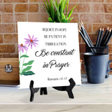 Rejoice In Hope, Be Patient In Tribulation, Be Constant In Prayer. Romans 12:12 5"x 5" Square Table Sign With Acrylic Easel | Religious Bible Quotes Decor