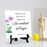 Rejoice In Hope, Be Patient In Tribulation, Be Constant In Prayer. Romans 12:12 5"x 5" Square Table Sign With Acrylic Easel | Religious Bible Quotes Decor