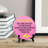 Attention Please Do Not Flush Paper Towels or Feminine Products in Toilets Circle Table Sign with Acrylic Stand (5x5") | Public Bathroom Signage