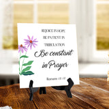 Rejoice In Hope, Be Patient In Tribulation, Be Constant In Prayer. Romans 12:12 5"x 5" Square Table Sign With Acrylic Easel | Religious Bible Quotes Decor