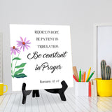Rejoice In Hope, Be Patient In Tribulation, Be Constant In Prayer. Romans 12:12 5"x 5" Square Table Sign With Acrylic Easel | Religious Bible Quotes Decor