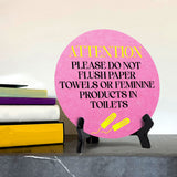 Attention Please Do Not Flush Paper Towels or Feminine Products in Toilets Circle Table Sign with Acrylic Stand (5x5") | Public Bathroom Signage