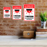 Portrait Round Plus La tienda está monitoreada y protegida por dispositivos antirrobo Wall or Door Sign | Spanish Dressing Room Retailer Signage