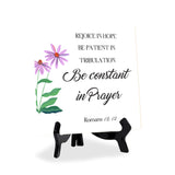 Rejoice In Hope, Be Patient In Tribulation, Be Constant In Prayer. Romans 12:12 5"x 5" Square Table Sign With Acrylic Easel | Religious Bible Quotes Decor