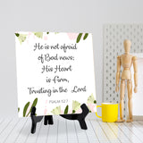 He Is Not Afraid Of Bad News; His Heart Is Firm, Trusting In The Lord. Psalm 112:7 5"x 5" Square Table Sign With Acrylic Easel | Religious Bible Quotes Decor