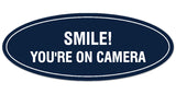 Signs ByLITA Oval Smile You're on Camera Sign - Laser-Engraved Lettering | Durable ABS Plastic | Vibrant Colors | Powerful Foam Tape