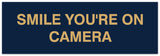 Signs ByLITA Basic Smile you're on camera Sign - Laser-Engraved Lettering | Durable ABS Plastic | Vibrant Colors | Powerful Foam Tape