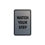 Portrait Round Watch Your Step Sign with Adhesive Tape, Mounts On Any Surface, Weather Resistant