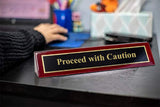 Piano Finished Rosewood Novelty Engraved Desk Name Plate 'Proceed With Caution', 2" x 8", Black/Gold Plate