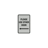 Portrait Round please use other door left arrow Sign with Adhesive Tape, Mounts On Any Surface, Weather Resistant